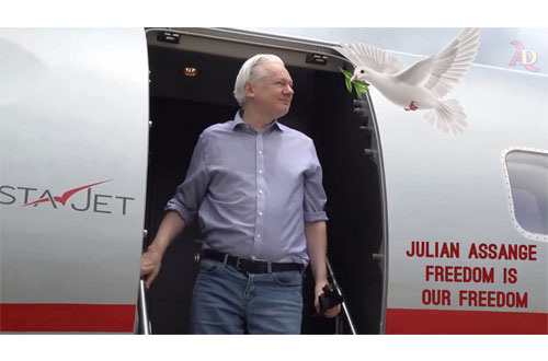 On June 26, Julian Assange arrives at Saipan International Airport for his court hearing where he will be released.